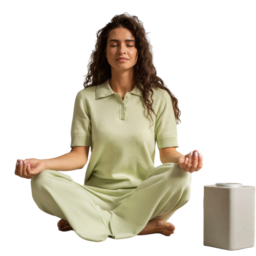 full-shot-woman-meditating-home